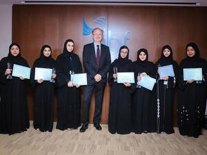 The graduates with the bank's CEO Vince Cook.