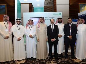 Abdulhakeem Al Khayyat with officials from KFH-Bahrain