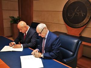 Mr Ian Johnston, Chief Executive of the DFSA, and Mr Sami Saliba, Executive Board Member of the CMA