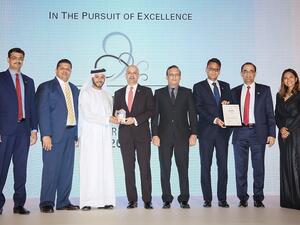 NBF team receiving Best Commercial Bank award.