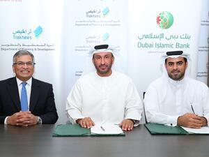 Omar Al Hamli, Executive Director, Business Support in Trakhees; Musabbah Al Qaizi, Head of Electronic Banking Services & IT; and Naveed Ali, Chief of Corporate Banking, DIB, during the signing ceremony.