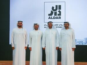His Excellency Mohamed Khalifa Al Mubarak, Chairman of Aldar Properties, His Excellency Saif Al Hajeri, Chairman of the Department of Economic Development, His Excellency Ahmed Al Sayegh, Minister of State and Chairman of Abu Dhabi Global Market and Talal Al Dhiyebi, Chief Executive Officer, Aldar Properties at the launch of Aldar Investments at Abu Dhabi Global Market (ADGM).