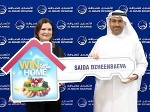 Rashed Al Ansari, General Manager of Al Ansari Exchange and Saida Dzheenbaeva, the winner of the Dream Home.