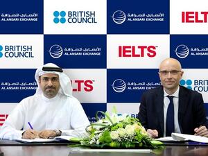 Rashed Ali Al Ansari, General Manager, Al Ansari Exchange, and Nicholas David Godfrey, Country Examinations Manager, British Council, during the signing of the agreement.
