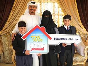 Seba Dabik, winner of the Grand Prize, with her family