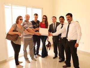 Startsev Family receiving Villa 41