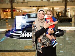 منى أبو عايش الفائزة بسيارة رنج روفر من سيتي سنتر مردف