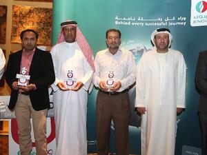 Winners of Innov8 programme with ENOC executives
