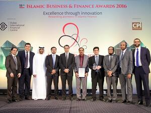 Representatives from NBF receive the award for Best New Islamic Window 