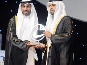 Ali Saeed Bin Harmal Al Dhaheri, Chairman of ADU Executive Board receiving the award