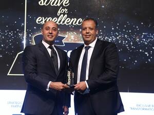 Gabi Habib, Country Retail Manager receiving the award for ‘Super Retailer of the Year’