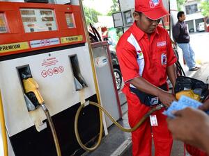 The increased fuel prices in Bahrain came into effect from 2:00pm yesterday. (AFP)