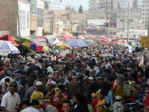 It’s hurting business for those supermarkets trying to make an honest living, but some salesmen say it’s actually good for business as the bazaar draws so many people to the area