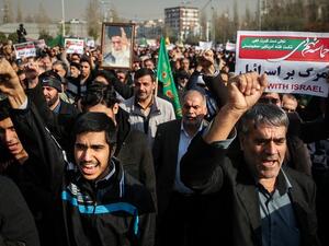 In its latest report, the Iranian Parliament Research Center put the country’s economic growth in the current year at 4.1 percent. (AFP)