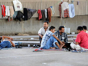 "عملية الإصلاح البارزة"، إلا أن "العديد من العمال لا يزالون عالقين في ظروف قاسية