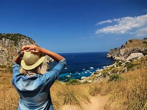 Summer vacations could trigger a less cautious approach to spending. (Pexels)