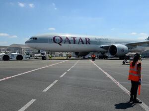 A Qatar Airways Boeing 777-300 is moved on the Tarmac of Le Bourget airport on June 18, 2017. (AFP)