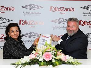 خلال توقبع الإتفاقية على إنشاء منطقة لمكتبة قطر الوطنية داخل مدينة كيدزانيا الدوحة.