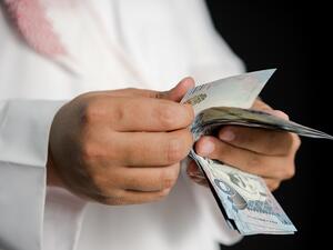 Some banks claim that they suffer because many people do not pay back their loan installments. (Shutterstock)