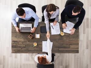 What should you include in your thank-you note after a job interview? Here are four main points to keep in mind. (Shutterstock)