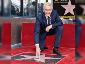 Actor Michael Douglas unveils his star on the Hollywood Walk of Fame in Los Angeles. 