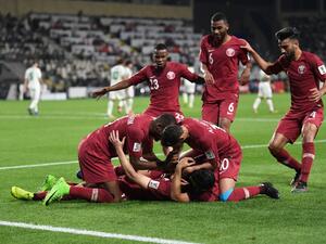  Qatar won a knockout game at the Asian Cup for the first time, downing Iraq to reach the quarter-finals thanks to Bassam Al Rawi. 