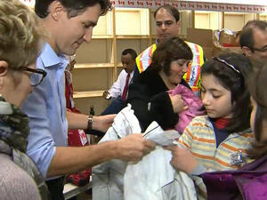 Canadian Prime Minister Justin Trudeau greets Syrian refugees in Toronto. (Twitter)