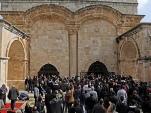 Palestinians worshippers gather before Friday noon prayers last week at the so-called 'Golden Gate' in Jerusalem's Old City. (AFP/ File Photo)