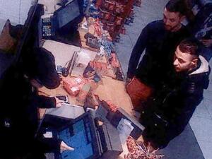 This file video image taken from a CCTV camera at a petrol station north of Paris on November 11, 2015 shows Salah Abdeslam (R), a suspect in the Paris attacks, and Mohamed Abrini (C) buying goods. (AFP/File) This file video image taken from a CCTV camera at a petrol station north of Paris on November 11, 2015 shows Salah Abdeslam (R), a suspect in the Paris attacks, and Mohamed Abrini (C) buying goods. (AFP/File)