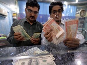 Remittances by foreign workers have witnessed a steady fall in recent months as banks in Kingdom reported a gradual decline in foreign remittances. (AFP/ File)