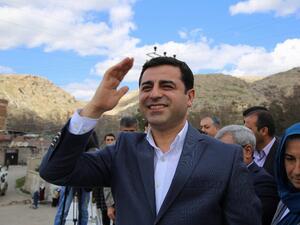 Co-leader of the pro-Kurdish Peoples' Democratic Party (HDP) Selahattin Demirtas waving as Kurds gather for Noruz celebrations in Diyarbakir, southeastern Turkey. Demirtas criticised the German government's dealings with the Turkish government on April 12, 2016. (AFP/File) Co-leader of the pro-Kurdish Peoples' Democratic Party (HDP) Selahattin Demirtas waving as Kurds gather for Noruz celebrations in Diyarbakir, southeastern Turkey. Demirtas criticised the German government's dealings with the Turkish government on April 12, 2016. (AFP/File)