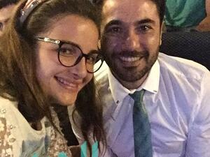 Egyptian actor Ahmed Ezz and his friend Sham al Dahabi watch his movie "Welad Rizk" together. (Al Jaras Magazine)