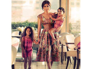 Sherine with her two daughters. (File photo)