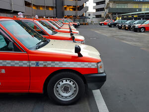 Many metropolis orange taxi cars. (Shutterstock/ File Photo)