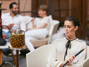 Woman Smoking Shisha (Shutterstock)