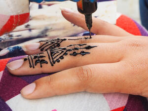 Henna tattoos being put on girls hand in Morocco. (Shutterstock/ File Photo)