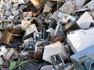 Once a breaking session is over, cleaners sweep away the wreckage, filling it into blue cloth bags to be transported to recycling centers for a chance at a brand new life instead of ending up in a landfill (Shutterstock/File)