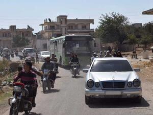 خروج 100 مسلح من حي الوعر في حمص