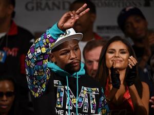 Floyd Mayweather Jr. speaks during a post-fight news conference after he retained his WBC/WBA welterweight titles in a unanimous-decision victory over Andre Berto (AFP) Floyd Mayweather Jr. speaks during a post-fight news conference after he retained his WBC/WBA welterweight titles in a unanimous-decision victory over Andre Berto (AFP)