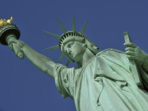 Despite the US' iconic Statue of Liberty, which is meant to welcome the world's "huddled masses yearning to breathe free," the US only accepted 400 Syrian refugees last year, while countries like Germany have taken in hundreds of thousands.  (AFP/File)