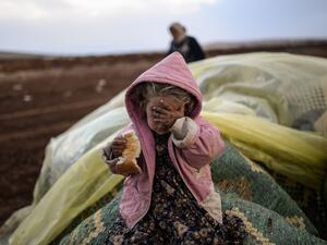 "All they want is taking pictures," says a Jordanian man of the many aid organizations in his country trying to help Syrian refugees.  Aid workers, often foreign and unaware of local customs, tend to bring with them an unbalanced power dynamic when working with refugees, writes Ann-Christin Wagner.  (AFP/Bulent Kilic)