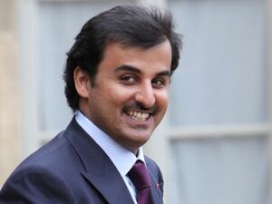 الأمن المصري يقبض على شاب بحوزته صورة لأمير قطر‎
