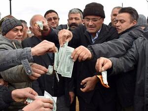 هكذا استجاب الأتراك لطلب أردوغان لإنقاذ الليرة 