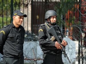 Tunisian security forces stand guard outside the National Bardo Museum in Tunis on March 19, 2015. (AFP/File)