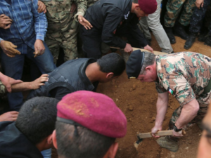 The king of Jordan attended the funeral of Major Rashed Hussein Zyoud, the officer killed during raids against suspected Daesh militants in the northern city of Irbid. (Photo: Royal Hashemite Court Twitter)