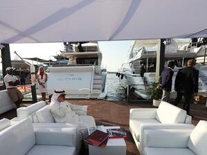Visitors check boats docked at the Dubai International Marine Club during the Gulf emirate's international Boat Show on February 28, 2017. (Karim Sahib/ AFP)