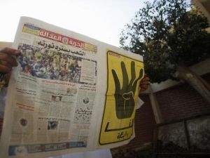 The Muslim Brotherhood's Freedom and Justice newspaper headquarters was raided Wednesday despite government statements that the ban on Muslim Brotherhood activities may be delayed (Courtesy of Euro News)