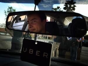 Uber has been given three dedicated areas to transport passengers to and from King Khalid International Airport.
 (Mark Ralston/ AFP)