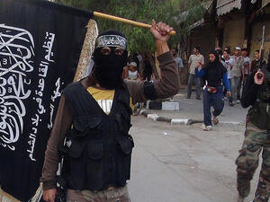 Clashes between government forces and IS militants broke out close to the Syrian army's last remaining base in the Deir Ezzor province (File/AFP)