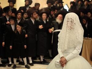Some ultra-orthodox Jews have accused the Israeli Knesset of discrimination after it raised the national marriage age from 17 to 18. (Image via Times of Israel)